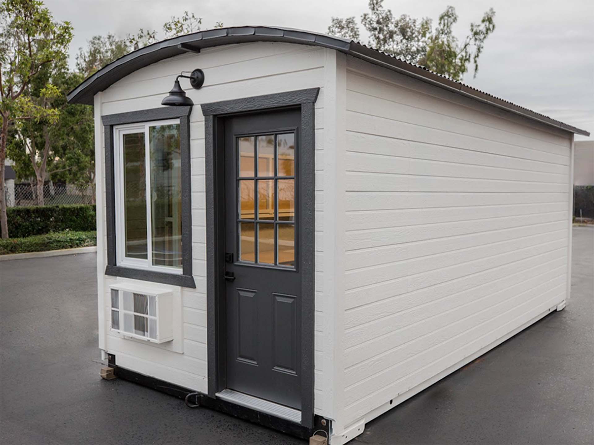 Row of Foldum micro-shelters for disaster relief and workforce housing